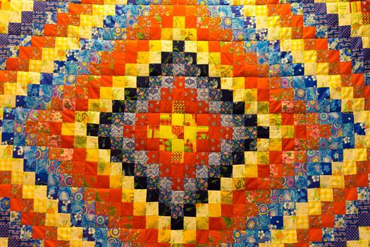 mottled background in patchwork fabrics of different colors