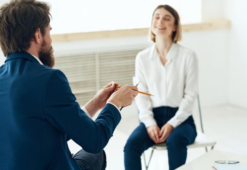 Woman at the reception of a psychologist consultation communication depression. High quality photo