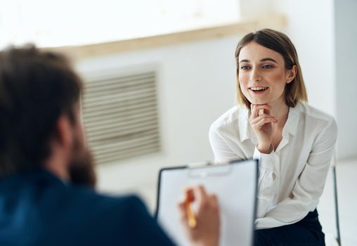 woman in consultation with a psychotherapist message health diagnosis. High quality photo