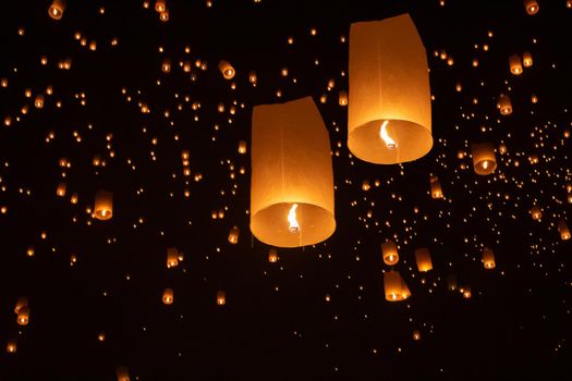 Tourist floating sky lanterns in Loy Krathong festival , Chiang Mai ,Thailand.