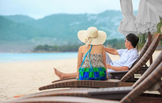 Middle aged couple relaxing at chaweng beach in koh samui ,Thailand.