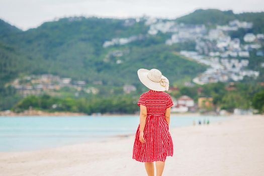 Middle aged woman relaxing at chaweng beach in koh samui ,Thailand.