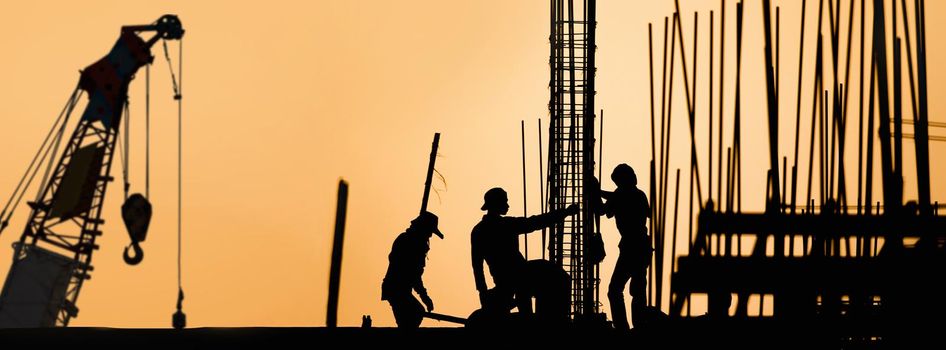 construction worker silhouette on the work place