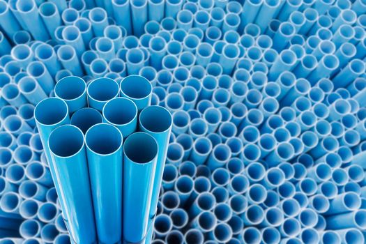 PVC pipes stacking on shelf in warehouse