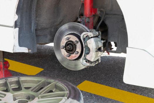 Front car disc brake repair on road