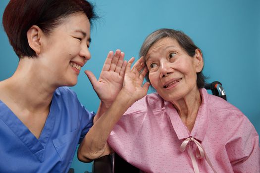 Asian seniors woman hearing loss , Hard of hearing