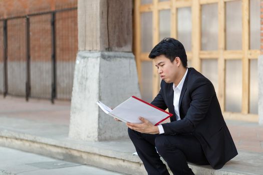 Business man in distress of job losses due to COVID-19 virus pandemic