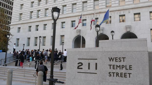 LOS ANGELES, CALIFORNIA, USA - 30 OCT 2019: People strike near Hall of Justice. Protest picket in front of Sheriff's Department and Courthouse. Demonstration of activists near LA government building.