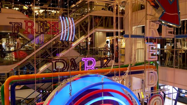 BANGKOK, THAILAND - 18 DECEMBER, 2018: Siam Centre. Interior of a large modern shopping mall center. Decorative compositions, contemporary design details. The concept of high consumption in society.