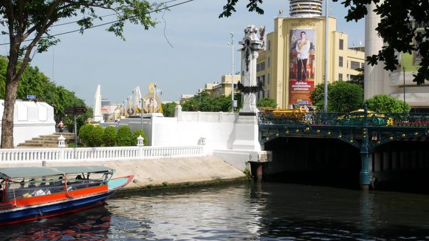 BANGKOK, THAILAND, 11 JULY 2019: Canal as classic typical water way for public passengers transportation. Street city life on khlong. Local people use boat as traditional transport during traffic jam.