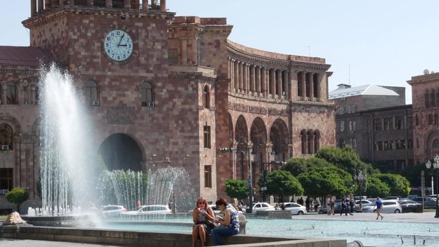 YEREVAN, ARMENIA, CAUCASUS - 28 AUGUST 2019: Central Republic Square, caucasian armenian capital, soviet architectural heritage, downtown classical street city life on sunny day. Kentron architecture.