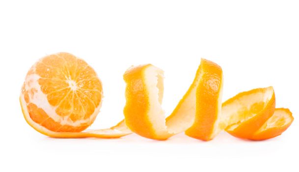 orange and orange peeled skin isolated white background