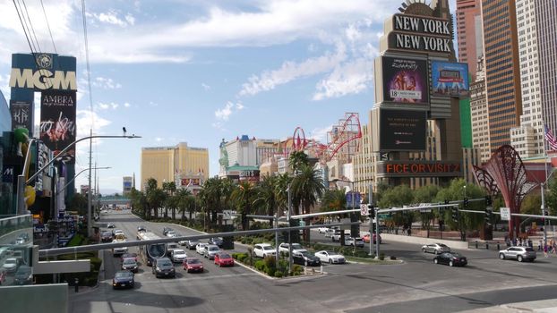 LAS VEGAS, NEVADA USA - 7 MAR 2020: The Strip boulevard with luxury casino and hotels in gambling sin city. Car traffic on road to Fremont street in tourist money playing resort. New York-New York.
