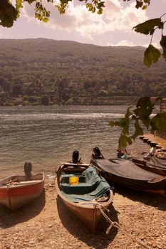 the fishing harbour and beach on the island of Isla Pescatori on the Lago maggiore  in Piemont in north Italy.  Italy, Piemont, October, 2011