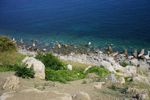 the rocky coastline, clear sea blue.