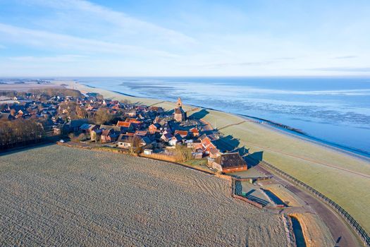 Aerial from the village Wierum on a beautiful winter day in the Netherlands