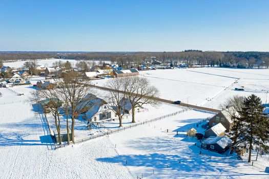 Aerial from a dutch landscape in winter in the Netherlands
