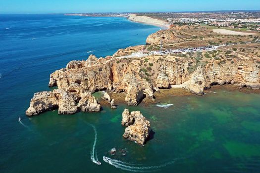 Aerial from Ponte Piedade with the lighthouse in Lagos the Algarve Portugal