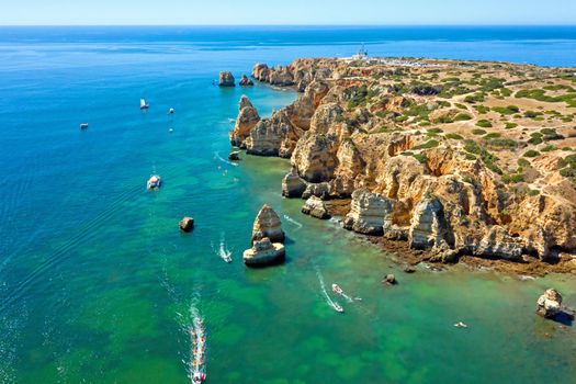 Aerial from Ponte Piedade with the lighthouse in Lagos the Algarve Portugal