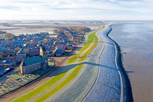 Aerial from the village Wierum on a beautiful winter day in the Netherlands