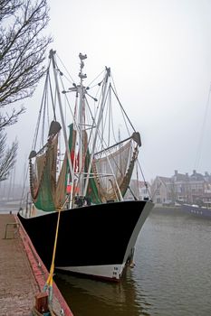 Fishing boats in the harbor from Harlingen in the Netherlands