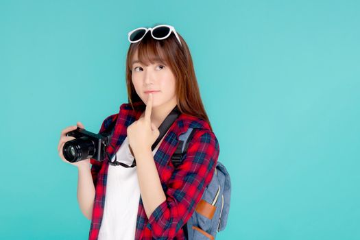 Beautiful young asian woman thinking idea travel trip summer isolated on blue background, asia girl having activity hobby take a photo holding camera, tourist journey in vacation and holiday.