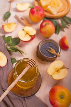 Jewish holiday Rosh Hashana background with apples, honey on blackboard. View from above. Flat lay