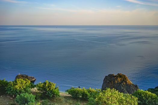Sevastopol, Crimea. Seascape with views of the coastline overgrown with vegetation.