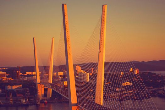 Vladivostok, Russia.Night view of the bridge of the Golden horn in summer.