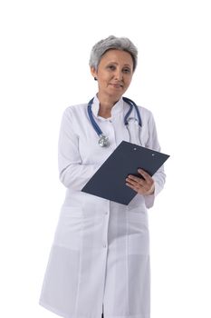 Asian mature female medical doctor with stethoscope taking notes isolated on white background