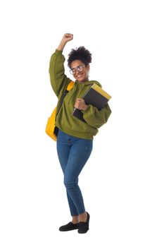 Friendly ethnic black female high school student in eyeglasses with backpack and composition book isolated on white background, full length portrait