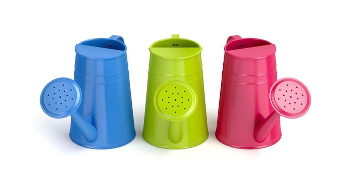 Three colorful watering cans on white background