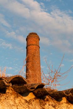Old chimney with stork's nest in southern Andalusia