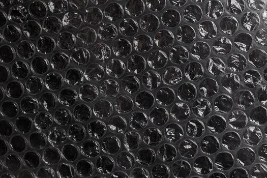 dark air bubble wrap - real life close-up flat texture and background