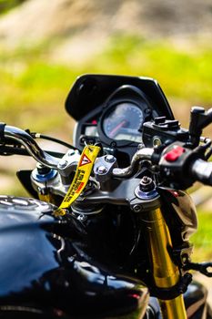 Detail of black motorcycle. Honda Hornet motorcycle detail photo in Bucharest, Romania, 2021