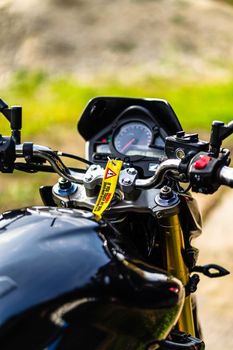 Detail of black motorcycle. Honda Hornet motorcycle detail photo in Bucharest, Romania, 2021