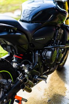 Detail of black motorcycle. Honda Hornet motorcycle detail photo in Bucharest, Romania, 2021