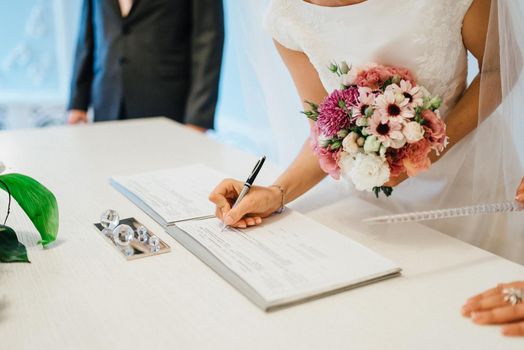 elegant wedding bouquet of fresh natural flowers and greenery