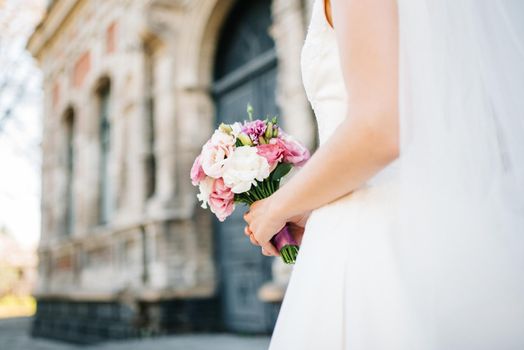 elegant wedding bouquet of fresh natural flowers and greenery