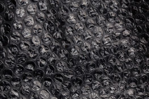 dark air bubble wrap - real life close-up flat texture and background