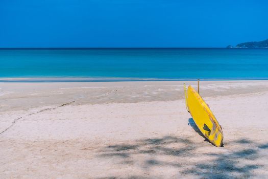 Many surfboards for rent  at summer beach with sunlight  blue sky background. 