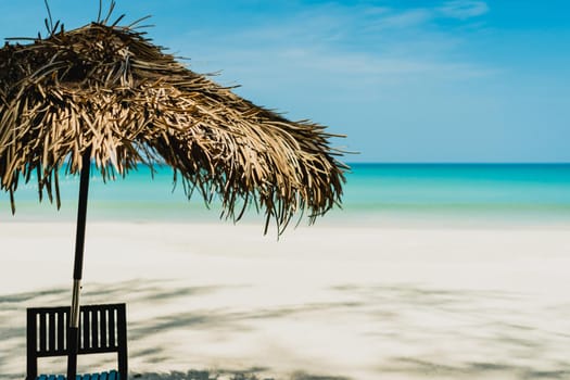 Table and chair at tropical summer beach background.