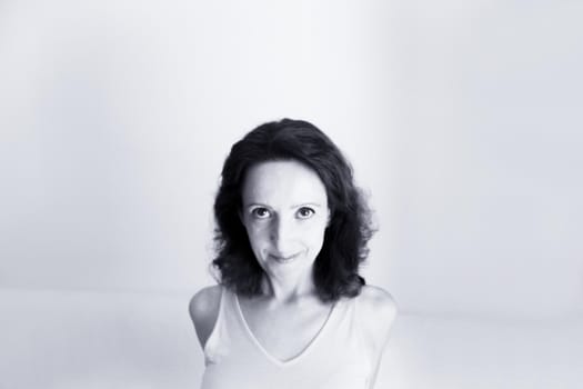 Portrait of woman with happy and positive expression. Copy space.