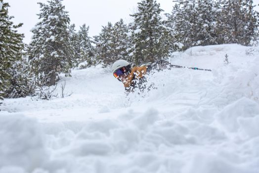 Young man skiing in the Pyrenees at the Grandvalira ski resort in Andorra in Covid19 time.