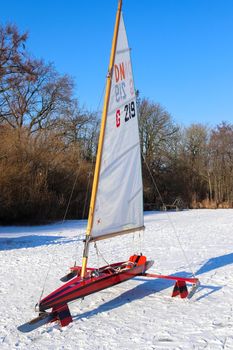 Iceboat runner ready for a ride  on a frozen lake