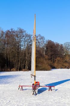 Iceboat runner ready for a ride  on a frozen lake