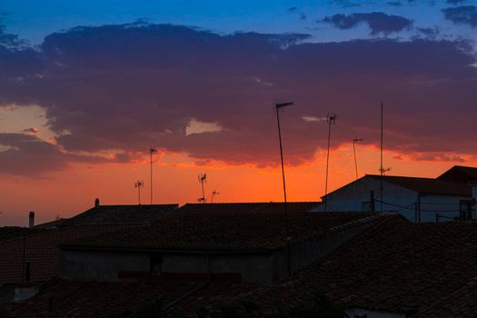 Sunset in a town in southern Andalusia, with beautiful shades of orange and blue