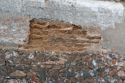 old stone wall collapsing in southern spain