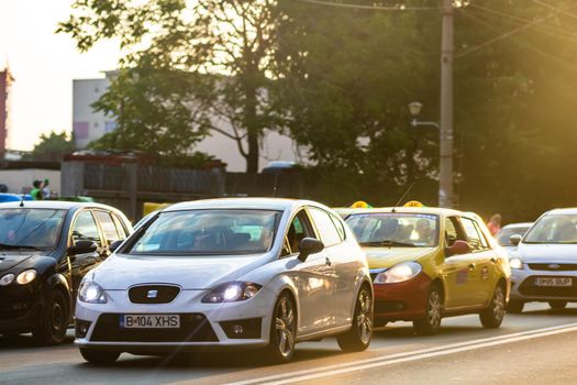 Car traffic at rush hour in downtown area of the city. Car pollution, traffic jam in the morning and evening in the capital city of Bucharest, Romania, 2021