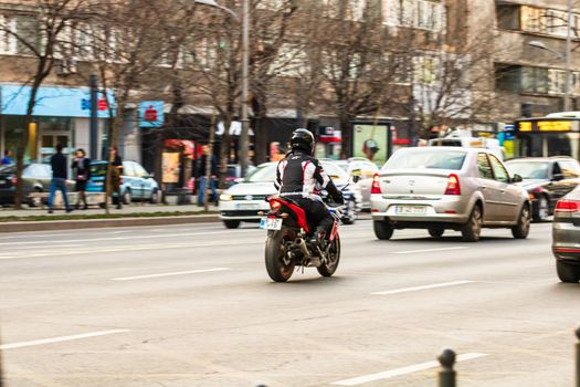 Car traffic at rush hour in downtown area of the city. Car pollution, traffic jam in the morning and evening in the capital city of Bucharest, Romania, 2020